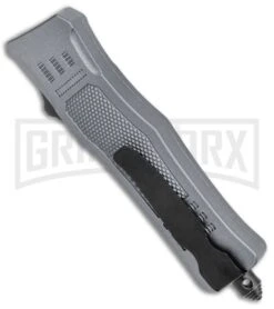 Atomic Defender Mini OTF Automatic Knife Gray - Serrated Two Tone Dagger 9 Atomic Defender Mini OTF Automatic Knife Gray - Serrated Two Tone Dagger -Grindworx Atomic Defender Mini OTF Auto Gray TT Dagger Serr GX 37391 jr side large